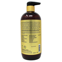 Conditioner bottle with black pump top, amber-brown plastic, yellow ingredients panel