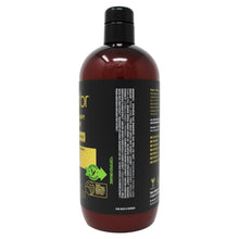 Conditioner bottle with black pump top, amber-brown plastic, back label visible