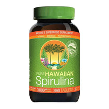 Spirulina supplement bottle with green cap and front label reading Pure Hawaiian Spirulina
