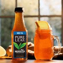 Pure Leaf sweet tea bottle with a glass pitcher of amber tea