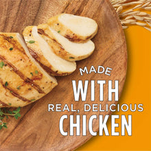 Chicken meal on wooden board with “Made with real, delicious chicken” text