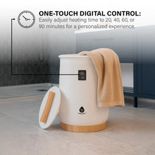 White towel warmer with wooden base and beige towel, with touch digital display
