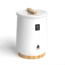 White towel warmer with wooden base, open lid, and digital temperature display