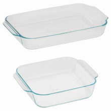 Clear glass oblong baking dish with teal rim and side handles