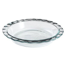 Clear glass pie plate with oval shape and two side handles