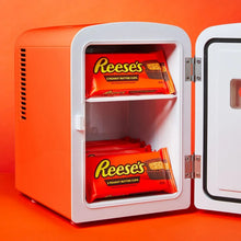 Milk chocolate peanut butter cups in open white cooler, Reese's packs
