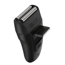 Electric foil shaver with foils and rear attachment slot, black design