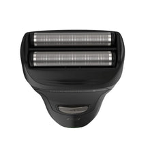 Electric foil shaver head close-up with dual foil cartridges