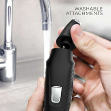 Black trimmer head with washable attachment being installed by hand