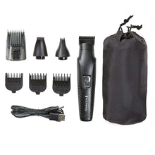 REMINGTON 7-piece grooming kit with trimmer, combs, cable, and storage pouch