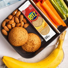 Cheese cracker sandwiches in a tray with wrapped cracker snack