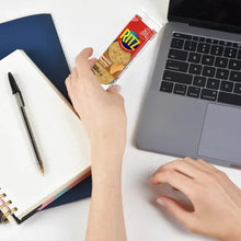 Hand holding RITZ peanut butter cracker sandwich box