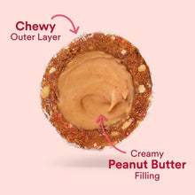 Sliced RXBAR bite cross-section showing chewy outer layer and creamy peanut butter filling