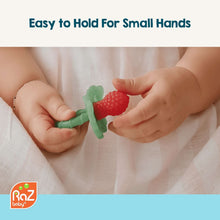 Silicone pacifier-style teether with textured red and green grip handles