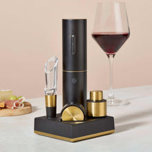 Electric wine set with aerator tube, stoppers, and red wine glass, black and gold