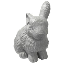 Gray rabbit statue with detailed fur texture, upright ears, sitting pose.