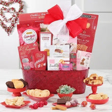 Red Valentine gift tin with assorted treats and red-and-white ribbon bow