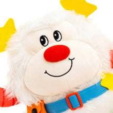 Close-up white plush face with yellow star ears, red nose, black eyes, blue belt detail