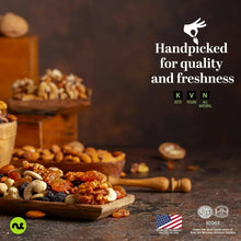 Pile of unshelled-style raw walnut halves and pieces in wooden serving bowl