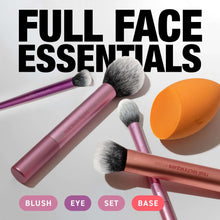 Makeup brush set with four mauve and purple brushes plus an orange beauty sponge