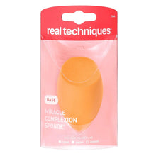 Orange Miracle Complexion Sponge in clear sleeve packaging