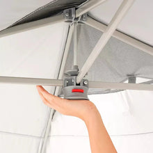 Omni shade canopy support with red lock lever being adjusted by hand