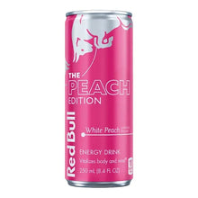 Red Bull White Peach Peace Edition energy drink can, pink label and silver top