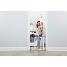 White baby safety gate with step-over opening; shown at doorway with hardware side