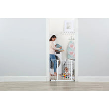White baby safety gate with step-over door and vertical bars for home entry control
