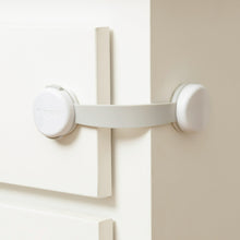White 3-pack child safety cabinet latches with pull-down strap and round covers