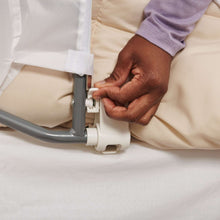 Anchor safety clip and base on swing-down bed rail guard