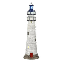Resin solar lighthouse with white brick texture, blue lantern top, and warm window lights