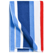 Blue and red vertical striped towel with folded corner