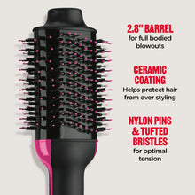 Revlon hair dryer brush with black barrel, pink accents, and nylon bristle pins
