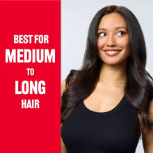 Revlon hair dryer brush styling result on woman with medium-to-long voluminous hair