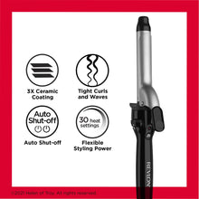 Triple ceramic curling iron showing silver barrel and black handle with side clamp.