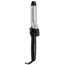 Triple ceramic curling iron with black handle and silver barrel, swivel cord.