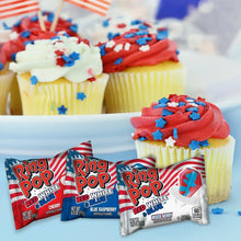 Ring Pop candy assortment with mini packs and frosted cupcakes with blue star sprinkles