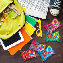 Ring Pop candy assortment with colorful lollipop pieces and foil wrappers