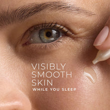 Retinol night serum application near eye with creamy gel and fingertip