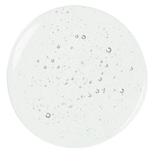 Micellar water droplets on a white circular pad