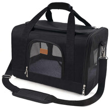 Black pet carrier with front mesh window, top handle, and side zipper door