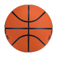 Orange basketball top view with black cross seams and Reebok logo panel