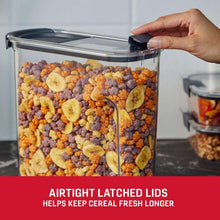 Clear cereal storage container with dark gray flip-top lid, opened and filled