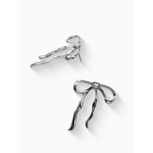 Silver bow earrings with dangling ribbon charms, post-back style