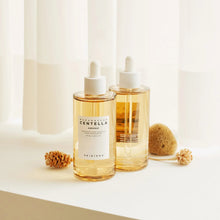 Two amber ampoule bottles with white dropper caps and label details