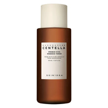 Cica essence toner bottle with amber-brown container and white cap