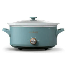 Crock-Pot 7-quart slow cooker with teal body, lid, side handles, and control knob