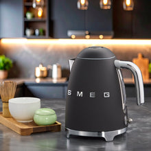 SMEG 50’s-style electric kettle, dark gray body with chrome handle and base