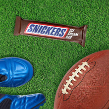 SNICKERS ice cream bar in brown wrapper with blue logo